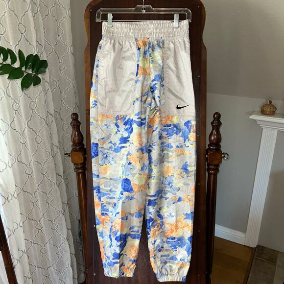 Nike Sportswear Tan & Floral Track Pants size XS women’s - Picture 2 of 16
